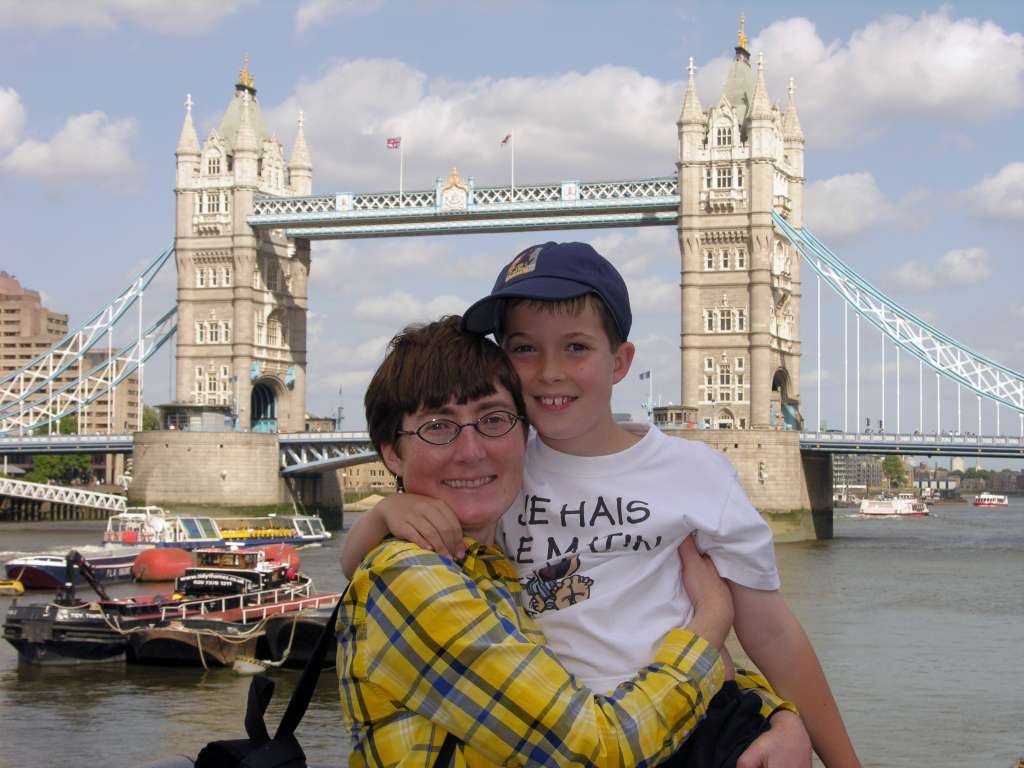 London 01 11 Tower Bridge Family Photo Charlotte and Pete enjoy a beautiful summer day near the Tower Bridge.